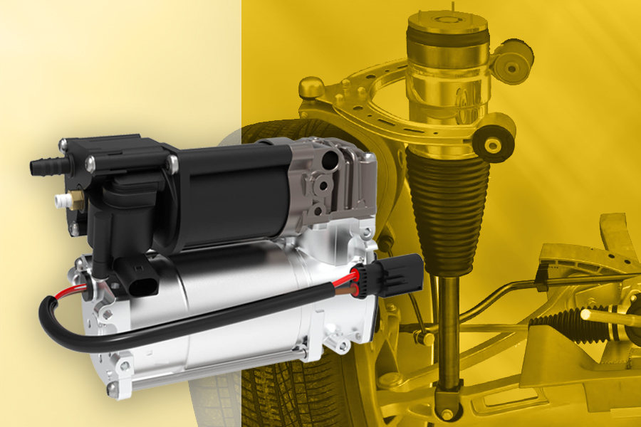 Compresseur de suspension pneumatique Magneti Marelli Parts & Services au premier plan, avec la roue, l'essieu et le système de suspension pneumatique à l'arrière-plan pour contextualiser l'application du composant.